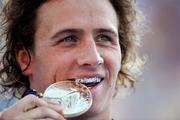 30 July 2009; Ryan Lochte, USA, with his Gold medal after winning the Men's 200m Individual Medley Final in a new World Record time of 1:54.10. FINA World Swimming Championships Rome 2009, Foro Italico, Rome, Italy. Picture credit: Brian Lawless / SPORTSFILE