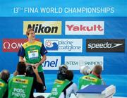 30 July 2009; Brazil's Cesar Cielo Filho waits to receive his Gold medal after he won the Men's 100m Freestyle final in a World Record time of 46.91, the first man ever to swim the discipline under 47 seconds. FINA World Swimming Championships Rome 2009, Foro Italico, Rome, Italy. Picture credit: Brian Lawless / SPORTSFILE