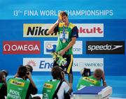 30 July 2009; Brazil's Cesar Cielo Filho wipes away a tear during the National Anthem after he received the Gold medal. Cesar won the Men's 100m Freestyle final in a World Record time of 46.91, the first man ever to swim the discipline under 47 seconds. FINA World Swimming Championships Rome 2009, Foro Italico, Rome, Italy. Picture credit: Brian Lawless / SPORTSFILE