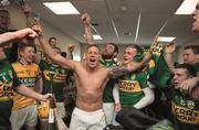 11 April 2015;    Toned and tattooed. Adrian Royle leads the post-match sing-song after Kerry's hurlers seal promotion following a play-off win over Antrim in Parnell Park.    Picture credit: Ray McManus / SPORTSFILE    This image may be reproduced free of charge when used in conjunction with a review of the book &quot;A Season of Sundays 2015&quot;. All other usage © SPORTSFILE