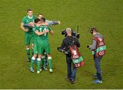 16 November 2015; Republic of Ireland players Seamus Coleman, Wes Hoolahan and Robbie Brady celebrate with goalscorer Jonathan Walters after the game. UEFA EURO 2016 Championship Qualifier, Play-off, 2nd Leg, Republic of Ireland v Bosnia and Herzegovina. Aviva Stadium, Lansdowne Road, Dublin. Picture credit: Brendan Moran / SPORTSFILE