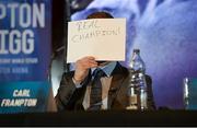18 November 2015; Carl Frampton holds a sign infront of his face during an IBF and WBA World Super Bantamweight unification clash press conference. Europa Hotel, Belfast, Co. Antrim. Picture credit: Oliver McVeigh / SPORTSFILE