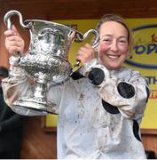 18 November2015; Lorna Brooke celebrates with the trophy after winning the Today FM Ladies Handicap Steeplechase on Moonlone Lane. Fairyhouse Racecourse, Fairyhouse, Co. Meath. Picture credit: Matt Browne / SPORTSFILE