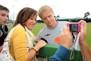 9 August 2009; Laura Hannah Griffiths, from Tipperary town, has her picture taken with Republic of Ireland's Damien Duff after squad training ahead of their international friendly against Australia on Wednesday. Republic of Ireland Squad Training, St. Michael's FC, Co. Tipperary. Picture credit: Diarmuid Greene / SPORTSFILE