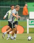 9 August 2009; Republic of Ireland's Liam Lawrence goes past team-mate Stephen Kelly during squad training ahead of their international friendly against Australia on Wednesday. Republic of Ireland Squad Training, St. Michael's FC, Co. Tipperary. Picture credit: Diarmuid Greene / SPORTSFILE