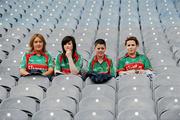 9 August 2009; Four Mayo supporters take their seats early for the game. GAA Football All-Ireland Senior Championship Quarter-Final, Meath v Mayo, Croke Park, Dublin. Picture credit: Ray McManus / SPORTSFILE