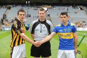9 August 2009; The Kilkenny captain Canice Maher and Tipperary captain Liam Butler shake hands accross referee Declan O'Driscoll before the start. ESB GAA All-Ireland Minor Hurling Championship Semi-Final, Kilkenny v Tipperary, Croke Park, Dublin. Picture credit: Ray McManus / SPORTSFILE