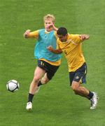 11 August 2009; Australia's Tim Cahill in action against team-mate Aaron Mooy, left, during squad training ahead of their international friendly against the Republic of Ireland on Wednesday night. Australia squad training, Thomond Park, Limerick. Picture credit: Diarmuid Greene / SPORTSFILE