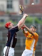 28 June 2008; MacNamee Awards 2008, Best Photograph - Oliver McVeigh, Sportsfile. Joe Canning, Galway, in action against Cormac Donnelly, Antrim. All-Ireland Senior Championship Qualifier, Round 1 2008, Casement Park, Belfast. This image from the match between Galway and Antrim epitomizes the photographic skill, vision, timing and concentration of the photographer in capturing a millisecond of time showing the sawdust flying and the hurl smashing in what is regarded as one of the fastest ball games in the world. It vividly reflects the courage, commitment and competition of the sport of hurling. Picture credit: Oliver McVeigh / SPORTSFILE