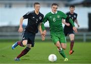 18 November 2015; Georgie Poynton, Republic of Ireland, in action against Ross McCrorie, Scotland. UEFA U19 Championships Qualifying Round, Group 1, Republic of Ireland v Scotland.  The Marketsfield, Limerick. Picture credit: Diarmuid Greene / SPORTSFILE