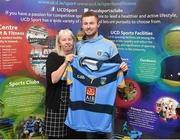 18 November 2015; Dublin and UCD footballer Jack McCaffrey is presented with a UCD jersey in recognition of his recent GAA GPA All-Star Footballer of the Year award, by Annette Billings, wife of the late Dave Billings, at the UCD GAA Scholarship Awards evening in UCD, Dublin. Picture credit: Stephen McCarthy / SPORTSFILE