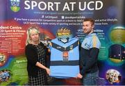 18 November 2015; Dublin and UCD footballer Jack McCaffrey is presented with a UCD jersey in recognition of his recent GAA GPA All-Star Footballer of the Year award, by Annette Billings, wife of the late Dave Billings, at the UCD GAA Scholarship Awards evening in UCD, Dublin. Picture credit: Stephen McCarthy / SPORTSFILE