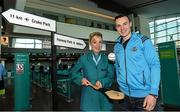20 November 2015; Dublin hurler Liam Rushe with Susan Brown from Aer Lingus at Dublin Airport ahead of their departure to Boston for the AIG Fenway Hurling Classic and Irish Festival. Dublin Airport, Dublin. Photo by Sportsfile