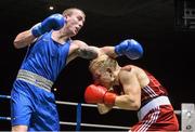 20 November 2015; David Biscevis, right, St.Saviours Boxing Cub, trades punches with Shane Egan, Bracken Boxing Club, during the 75kg contest. IABA Elite Boxing Championships. National Stadium, Dubllin. Picture credit: David Maher / SPORTSFILE