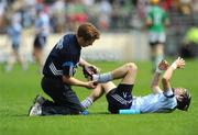 26 July 2009; Alan McCrabbe, Dublin, is treated by Chartered Physiotherapist Colm Daly. GAA All-Ireland Senior Hurling Championship Quarter-Final, Dublin v Limerick, Semple Stadium, Thurles, Co. Tipperary. Picture credit: Ray McManus / SPORTSFILE