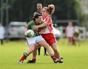 15 August 2009; Nicola Hurst, Mayo, in action against Gemma Begley, Tyrone. TG4 All-Ireland Ladies Football Senior Championship Quarter-Final, Tyrone v Mayo, Ballymahon GAA Club, Ballymahon, Co. Longford. Photo by Sportsfile