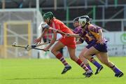 15 August 2009; Orla Cotter, Cork, in action against Michelle O'Leary and Kate Kelly, Wexford. Gala All-Ireland Senior Camogie Championship Semi-Final, Cork v Wexford, Nowlan Park, Kilkenny. Picture credit: Matt Browne / SPORTSFILE