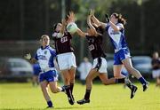 15 August 2009; Ger Conneally, left, and Annette Clarke, Galway, in action against Lavina Connolly, left, and Caitriona McConnell, Monaghan. TG4 All-Ireland Ladies Football Senior Championship Quarter-Final, Monaghan v Galway, Ballymahon GAA Club, Ballymahon, Co. Longford. Photo by Sportsfile