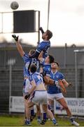 22 November 2015; Paul Sharry, St Loman's, rises above a crowd of players to punch the ball clear. AIB Leinster GAA Senior Club Football Championship Semi-Final, St Loman's v Ballyboden St Enda's. Cusack Park, Mullingar, Co. Westmeath. Picture credit: Seb Daly / SPORTSFILE