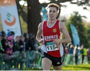 22 November 2015; Kevin Mulcaire, Ennis Track Club, on his way to winning the Junior Men's event. GloHealth National Cross Country Championships, Santry Demesne, Dublin. Picture credit: Cody Glenn / SPORTSFILE