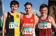 22 November 2015; Top three finishers in the Junior Men's event, from left, second place Peter Lynch, Kilkenny City Harriers, first place Kevin Mulcaire, Ennis Track Club, and third place Jack O'Leary, Mulingar Harriers. GloHealth National Cross Country Championships, Santry Demesne, Dublin. Picture credit: Cody Glenn / SPORTSFILE