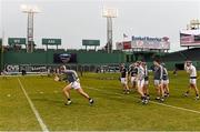 22 November 2015; Members of the Galway squad warm-up on the pitch before the game. AIG Fenway Hurling Classic, Dublin v Galway. Fenway Park, Boston, MA, USA. Picture credit: Ray McManus / SPORTSFILE