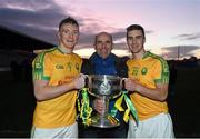 22 November 2015; Denis and Daniel Daly with their father Denis Snr and the Bishop Moynihan Cup following South Kerry's victory. Kerry County Senior Football Championship Final Replay, South Kerry v Killarney Legion. Fitzgerald Stadium, Killarney, Co. Kerry. Picture credit: Stephen McCarthy / SPORTSFILE