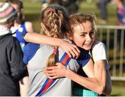 22 November 2015; First-place finisher Amy Rose Farrell, Blackrock A.C., facing, hugs third-place finisher Abigail Taylor, Dundrum South Dublin A.C., after the Under 16 girls event. GloHealth National Cross Country Championships, Santry Demesne, Dublin. Picture credit: Cody Glenn / SPORTSFILE