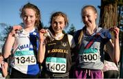 22 November 2015; Top finishers in the Under 16 girls event, from left, second place Claire Rafter, Tullamore Harriers A.C., first place Amy Rose Farrell, Blackrock A.C., and third place Abigail Taylor, Dundrum South Dublin A.C. GloHealth National Cross Country Championships, Santry Demesne, Dublin. Picture credit: Cody Glenn / SPORTSFILE