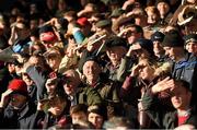22 November 2015; Spectators attempt to shield their eyes from the sun during the game. AIB Munster GAA Senior Club Hurling Championship Final, Ballygunner v Na Piarsaigh. Semple Stadium, Thurles, Co. Tipperary. Picture credit: Diarmuid Greene / SPORTSFILE