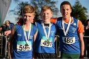 22 November 2015; Top finishers in the Under 14 Boy's event, from left, second place Sean Donoghue, Celtic A.C., first place Eoin Redmond, Riverstick/Kinsale A.C., and third place Daire O'SullEvan, Carraig-Na-Bhfear A.C. GloHealth National Cross Country Championships, Santry Demesne, Dublin. Picture credit: Cody Glenn / SPORTSFILE