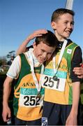 22 November 2015; Annalee A.C. team-mates Donal McSorley, left, is congratulated by Donnacha McNamara, after they finished 7th and 2nd respectively in the Under 12 Boy's event. GloHealth National Cross Country Championships, Santry Demesne, Dublin. Picture credit: Cody Glenn / SPORTSFILE