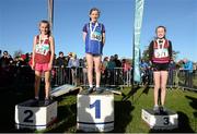 22 November 2015; Top finishers in the Under 12 Girl's event, from left,  second place Phoebe Bate, Mullingar Harriers A.C., first place Fiona Dillon, Thomastown A.C., and third place Hannah Breen, Crookstown Millview A.C.. GloHealth National Cross Country Championships, Santry Demesne, Dublin. Picture credit: Cody Glenn / SPORTSFILE