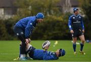 23 November 2015; Leinster's Jonathan Sexton warms up for training with Diarmaid Brennan, Senior Rehabilitation Coach, during squad training. Leinster Rugby Squad Training. Rosemount, UCD, Belfield, Dublin. Picture credit: Ramsey Cardy / SPORTSFILE