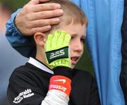 16 August 2009; A dejected Michael Kennedy, Listowel, Co. Kerry, after his team were beaten in the Gaelic Football Mixed Under 10's Final by Bagnalstown, Co. Carlow. HSE Community Games National Finals, Institute of Technology, Athlone, Co. Westmeath. Photo by Sportsfile