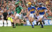 16 August 2009; Andrew O'Shaughnessy, Limerick, in action against Gavin O'Mahony, left, and Damien Reale, Tipperary. GAA Hurling All-Ireland Senior Championship Semi-Final, Tipperary v Limerick, Croke Park, Dublin. Picture credit: Stephen McCarthy / SPORTSFILE