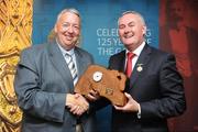 16 August 2009; Uachtarán Chumann Lúthchleas Gael Criostóir Ó Cuana presents Sportsfile photographer Oliver McVeigh, from Donaghmore, Co. Tyrone, with his 2008 GAA MacNamee Award for Best Photograph. Croke Park, Dublin. Picture credit: Stephen McCarthy / SPORTSFILE