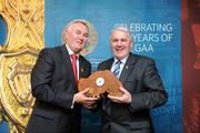 16 August 2009; Uachtarán Chumann Lúthchleas Gael Criostóir Ó Cuana presents Gerry Toman, from Loughinisland GAC, Down, with his 2008 GAA MacNamee Award for Best GAA History Publication. Croke Park, Dublin. Picture credit: Stephen McCarthy / SPORTSFILE