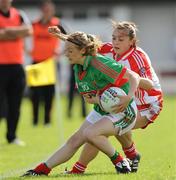 15 August 2009; Lisa Cafferkey, Mayo, in action against Roisin Rafferty, Tyrone. TG4 All-Ireland Ladies Football Senior Championship Quarter-Final, Tyrone v Mayo, Ballymahon GAA Club, Ballymahon, Co. Longford. Photo by Sportsfile