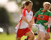 15 August 2009; Joline Donnelly, Tyrone, in action against Lisa Cafferkey, Mayo. TG4 All-Ireland Ladies Football Senior Championship Quarter-Final, Tyrone v Mayo, Ballymahon GAA Club, Ballymahon, Co. Longford. Photo by Sportsfile