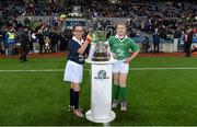 21 November 2015; The Cormac McAnallen Cup is brought to the plinth by Aisling and Morgan Early, from Mullaloo Beach Primary School, Perth, Australia, who are spending a year in Ireland in Scoil Áine, Raheny, Dublin. EirGrid International Rules Test 2015, Ireland v Australia. Croke Park, Dublin. Picture credit: Brendan Moran / SPORTSFILE