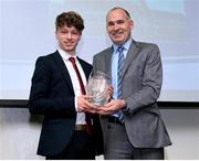 25 November 2015; Jim Dowdall, CEO of GloHealth, presents Kevin Mulcaire with his Junior Athlete of the Year Award during the GloHealth National Athletic Awards 2015, Crowne Plaza Hotel, Santry, Dublin. Picture credit: Matt Browne / SPORTSFILE