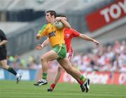 2 August 2009; Kevin Cassidy, Donegal, in action against Paul Kelly, Cork. GAA Football All-Ireland Senior Championship Quarter-Final, Cork v Donegal, Croke Park, Dublin. Picture credit: Oliver McVeigh / SPORTSFILE