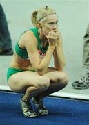 19 August 2009; Ireland's Derval O'Rourke watches the scoreboard for the official result after finishing 4th in the Women's 100m Hurdles Final in a National Record time of 12.67 seconds. 12th IAAF World Championships in Athletics, Olympic Stadium, Berlin, Germany. Picture credit: Brendan Moran  / SPORTSFILE