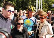 21 August 2009; Lance Armstrong, Astana, with family members of the recently deceased Paul Healion who was due to start the race today with the Ireland National Team ahead of the opening stage of the Tour of Ireland. 2009 Tour of Ireland - Stage 1, Enniskerry to Waterford. Picture credit: Stephen McCarthy / SPORTSFILE