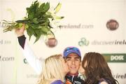 21 August 2009; Stage winner Russell Downing, Candi TV - Marshalls Pasta, with podium girls Claire Rutherford, left, and Stacey Kelly after stage 1 of the Tour of Ireland. 2009 Tour of Ireland - Stage 1, Enniskerry to Waterford. Picture credit: Stephen McCarthy / SPORTSFILE