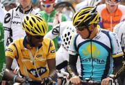 21 August 2009; Lance Armstrong, Astana, in conversation with Adrien Niyonshito, MTN Cycling, ahead of stage 1 of the Tour of Ireland. 2009 Tour of Ireland - Stage 1, Enniskerry to Waterford. Picture credit: Stephen McCarthy / SPORTSFILE