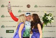 21 August 2009; Under 25 Rider leader Matti Breschel, Team Saxo Bank, with podium girls Claire Rutherford, left, and Stacey Kelly after stage 1 of the Tour of Ireland. 2009 Tour of Ireland - Stage 1, Enniskerry to Waterford. Picture credit: Stephen McCarthy / SPORTSFILE