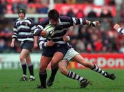 17 March 2000; Anthony Kelly of Terenure College is tackled by Mark Rooney of Clongowes Wood College during the Leinster Schools Senior Challenge Cup Final match between Terenure College and Clongowes Wood College at Lansdowne Road in Dublin. Photo by Aoife Rice/Sportsfile