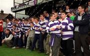 17 March 2000; Clongowes Wood College supporters prepare to race onto the pitch at the final whistle during the Leinster Schools Senior Challenge Cup Final match between Terenure College and Clongowes Wood College at Lansdowne Road in Dublin. Photo by Aoife Rice/Sportsfile